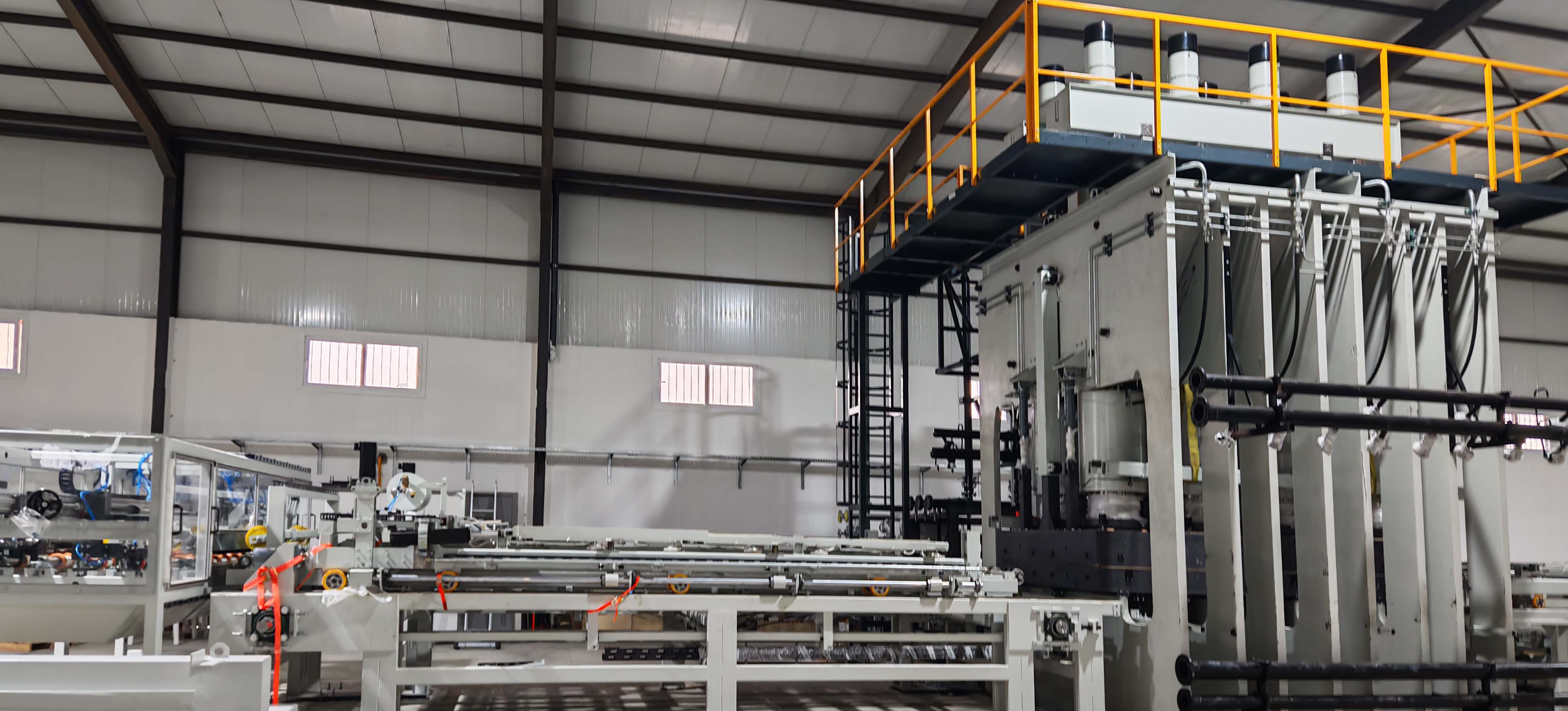 KT short cycle hot press line
